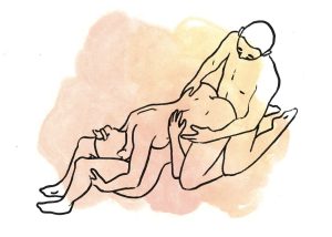 Having sex with one lady from behind, another lady is on her knees underneath,