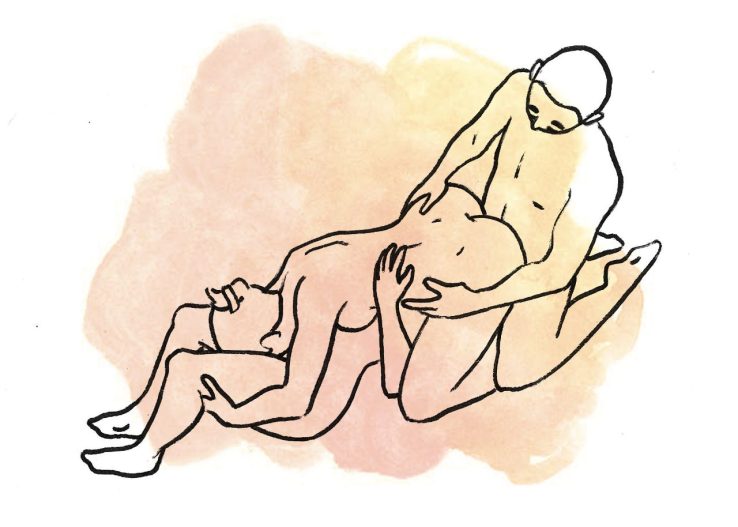 Having sex with one lady from behind, another lady is on her knees underneath,